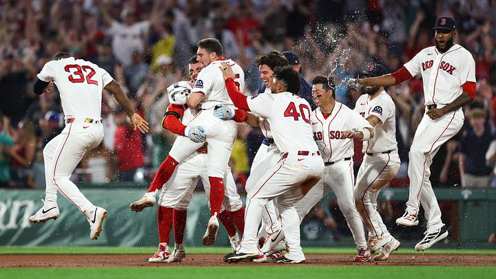 Boston Red Sox left fielder Jarren Duran celebrates after hitting an RBI single during the tenth inning against the New York Yankees at Fenway Park. Boston Red Sox left fielder Jarren Duran celebrates after hitting an RBI single during the tenth inning against the New York Yankees at Fenway Park.