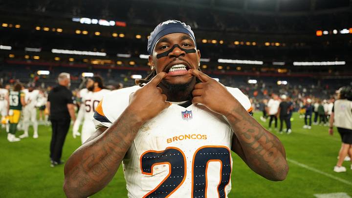 Jonah Coleman, former UW back, playfully poses for the camera after a preseason game against the Green Bay Packers. Jonah Coleman, former UW back, playfully poses for the camera after a preseason game against the Green Bay Packers.