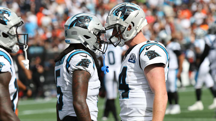 CHARLOTTE, NC - SEPTEMBER 29: Carolina Panthers wide receiver Diontae Johnson (5) and Carolina Panthers quarterback Andy Dalton (14) during an NFL football game between the Cincinnati Bengals and the Carolina Panthers on September 29, 2024 at Bank of America Stadium in Charlotte N.C. CHARLOTTE, NC - SEPTEMBER 29: Carolina Panthers wide receiver Diontae Johnson (5) and Carolina Panthers quarterback Andy Dalton (14) during an NFL football game between the Cincinnati Bengals and the Carolina Panthers on September 29, 2024 at Bank of America Stadium in Charlotte N.C.