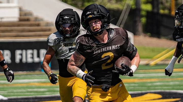 Southern Miss linebacker Tyler Lassiter (#2) returns an interception during the Golden Eagles' first fall camp scrimmage on Saturday. Southern Miss linebacker Tyler Lassiter (#2) returns an interception during the Golden Eagles' first fall camp scrimmage on Saturday.