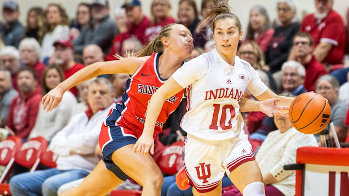 Southern Indiana's Ali Saunders (11) steals the ball from Indiana's Shay Ciezki (10) during the Indiana versus Southern Indiana women's basketball game at Simon Skjodt Assembly Hall on Tuesday, Dec. 3, 2024. Southern Indiana's Ali Saunders (11) steals the ball from Indiana's Shay Ciezki (10) during the Indiana versus Southern Indiana women's basketball game at Simon Skjodt Assembly Hall on Tuesday, Dec. 3, 2024.
