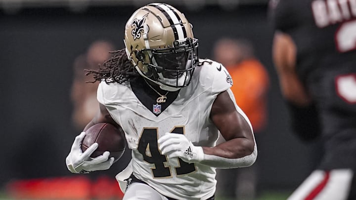 Sep 29, 2024; Atlanta, Georgia, USA; New Orleans Saints running back Alvin Kamara (41) runs against the Atlanta Falcons at Mercedes-Benz Stadium. Mandatory Credit: Dale Zanine-Imagn Images