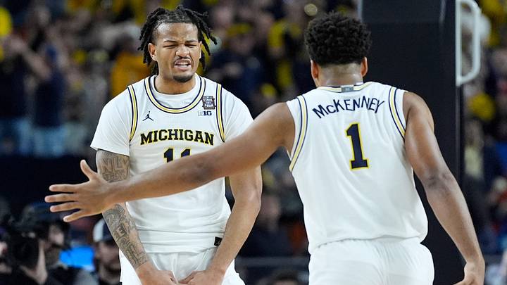 Michigan guard Roddy Gayle Jr. (11) reacts after dunking the ball during the first half of the NCAA national championship game against Connecticut at Lucas Oil Stadium in Indianapolis on Monday, April 6, 2026.