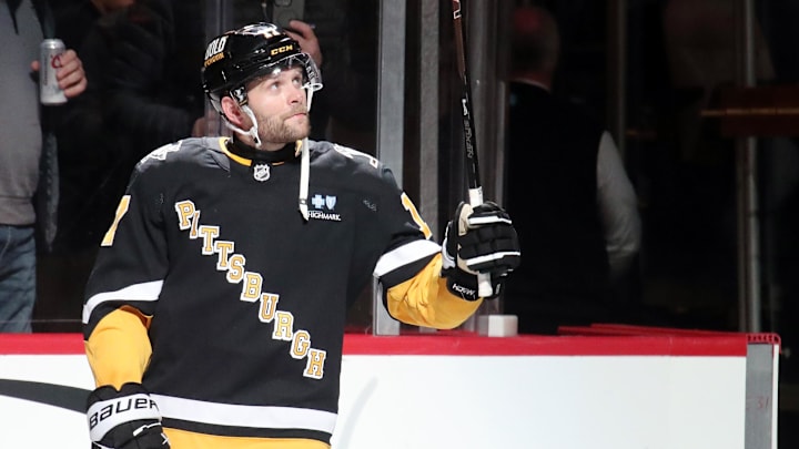 Dec 3, 2024; Pittsburgh, Pennsylvania, USA; Pittsburgh Penguins right wing Bryan Rust (17) reacts to being named first star of the game against the Florida Panthers at PPG Paints Arena. Mandatory Credit: Charles LeClaire-Imagn Images Dec 3, 2024; Pittsburgh, Pennsylvania, USA; Pittsburgh Penguins right wing Bryan Rust (17) reacts to being named first star of the game against the Florida Panthers at PPG Paints Arena. Mandatory Credit: Charles LeClaire-Imagn Images