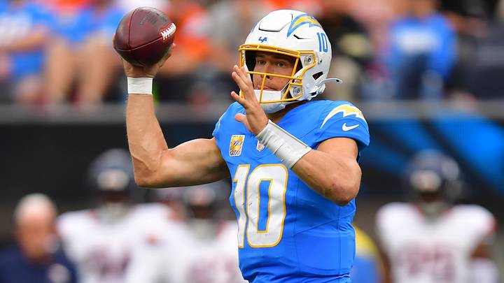 Los Angeles Chargers quarterback Justin Herbert (10) throws a pass against the Denver Broncos during the second half at SoFi Stadium.  Mandatory Credit: Gary A. Vasquez-Imagn Images