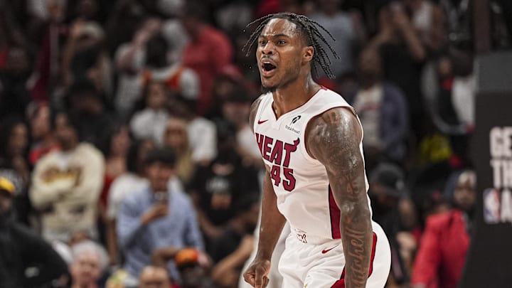 Apr 18, 2025; Atlanta, Georgia, USA; Miami Heat guard Davion Mitchell (45) reacts after the Heat defeat the Atlanta Hawks in overtime at State Farm Arena. Mandatory Credit: Dale Zanine-Imagn Images
