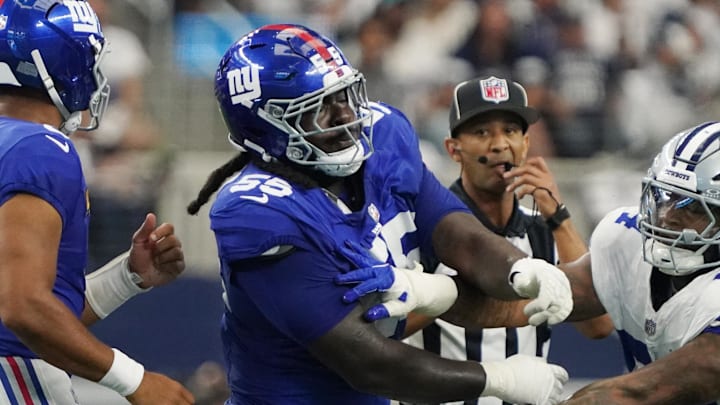 Sep 14, 2025; Arlington, Texas, USA; New York Giants offensive tackle James Hudson III (55) is called for a unnecessary roughness after a play against Dallas Cowboys defensive end Sam Williams (54) during the first quarter at AT&T Stadium. Mandatory Credit: Raymond Carlin III-Imagn Images