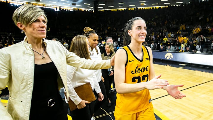 Iowa associate head coach Jan Jensen and Iowa guard Caitlin Clark (22) celebrate after a NCAA Big Ten Conference women's basketball game against Penn State, Saturday, Jan. 14, 2023, at Carver-Hawkeye Arena in Iowa City, Iowa. Iowa won, 108-67.
230114 Penn St Iowa Wbb 039 Jpg Iowa associate head coach Jan Jensen and Iowa guard Caitlin Clark (22) celebrate after a NCAA Big Ten Conference women's basketball game against Penn State, Saturday, Jan. 14, 2023, at Carver-Hawkeye Arena in Iowa City, Iowa. Iowa won, 108-67.
230114 Penn St Iowa Wbb 039 Jpg