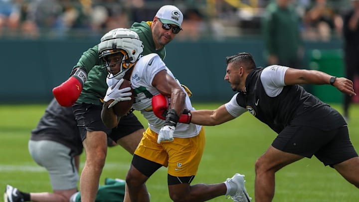 Gren Bay Packers running back MarShawn Lloyd (32) runs through a drill during the 11th practice of training camp on Tuesday, August 6, 2024, at Ray Nitschke Field in Ashwaubenon, Wis. 
Tork Mason/USA TODAY NETWORK-Wisconsin