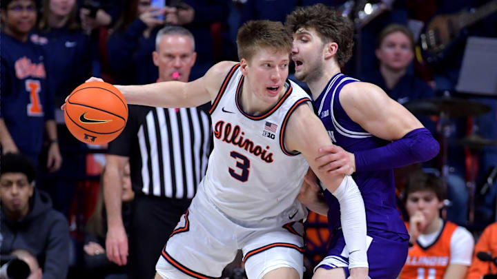 Jan 26, 2025; Champaign, Illinois, USA; Illinois Fighting Illini forward Ben Humrichous (3) drives the b all against Northwestern Wildcats forward Nick Martinelli (2) during the second half at State Farm Center. Mandatory Credit: Ron Johnson-Imagn Images Jan 26, 2025; Champaign, Illinois, USA; Illinois Fighting Illini forward Ben Humrichous (3) drives the b all against Northwestern Wildcats forward Nick Martinelli (2) during the second half at State Farm Center. Mandatory Credit: Ron Johnson-Imagn Images