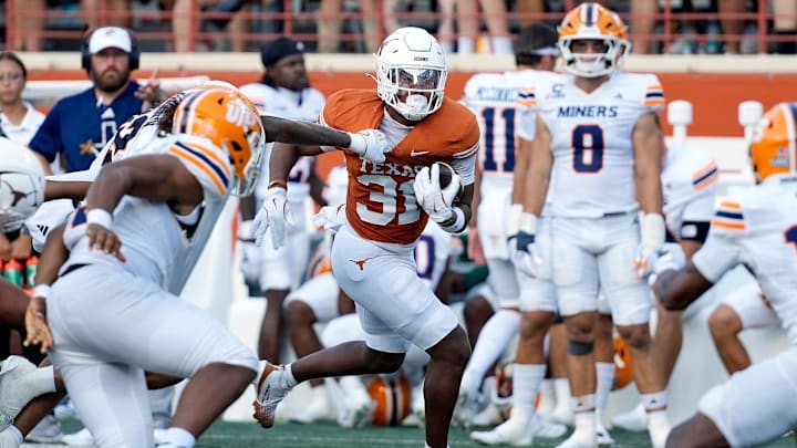 Texas Longhorns running back James Simon (31) runs for yards during the second half against the Texas El Paso Miners at Darrell K Royal-Texas Memorial Stadium.