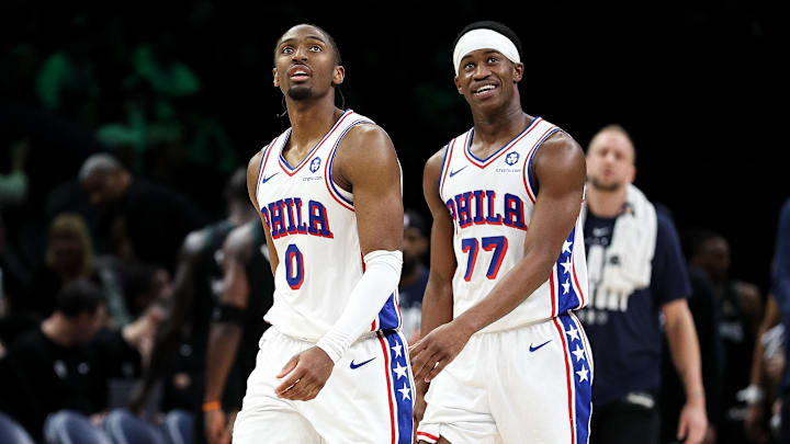 Feb 22, 2026; Minneapolis, Minnesota, USA; Philadelphia 76ers guard Tyrese Maxey (0) and guard Vj Edgecombe (77) look on during the second half against the Minnesota Timberwolves at Target Center. Mandatory Credit: Matt Krohn-Imagn Images