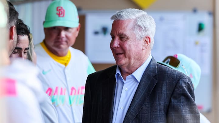 Aug 1, 2025; San Diego, California, USA; San Diego Padres owner John Seidler talks in the dugout before the game against the St. Louis Cardinals at Petco Park. Mandatory Credit: Chadd Cady-Imagn Images