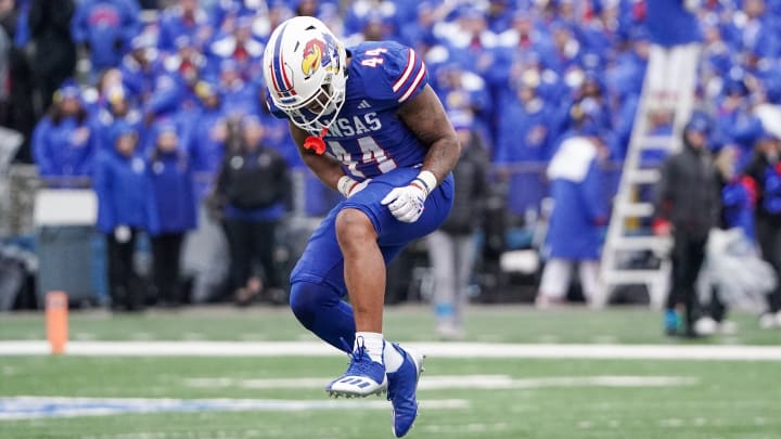 Oct 28, 2023; Lawrence, Kansas, USA; Kansas Jayhawks linebacker Cornell Wheeler (44) celebrates after a play against the Oklahoma Sooners during the second half at David Booth Kansas Memorial Stadium. Mandatory Credit: Denny Medley-USA TODAY Sports