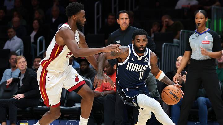 Oct 26, 2026; Miami, Florida, USA; Dallas Mavericks guard Kyrie Irving (11) drives to the basket against Miami Heat forward Andrew Wiggins (22) during the third quarter at Kaseya Center. Mandatory Credit: Sam Navarro-Imagn Images Oct 26, 2026; Miami, Florida, USA; Dallas Mavericks guard Kyrie Irving (11) drives to the basket against Miami Heat forward Andrew Wiggins (22) during the third quarter at Kaseya Center. Mandatory Credit: Sam Navarro-Imagn Images