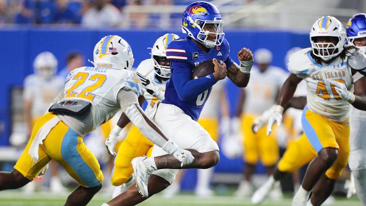 Kansas Jayhawks quarterback Isaiah Marshall (8) runs the ball during the game against LIU Sharks inside David Booth Kansas Memorial Stadium on Sept. 4, 2026. Kansas Jayhawks quarterback Isaiah Marshall (8) runs the ball during the game against LIU Sharks inside David Booth Kansas Memorial Stadium on Sept. 4, 2026.