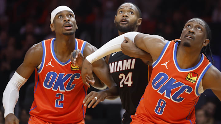 Dec 20, 2024; Miami, Florida, USA;   Oklahoma City Thunder guard Shai Gilgeous-Alexander (2), Oklahoma City forward Jalen Williams (8) and Miami Heat forward Haywood Highsmith (24) wait for a rebound during the second half at Kaseya Center. Mandatory Credit: Rhona Wise-Imagn Images