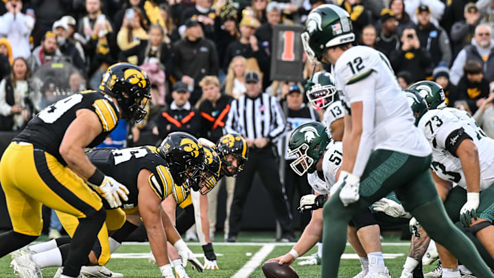 Nov 22, 2025; Iowa City, Iowa, USA; The line of scrimmage between the Iowa Hawkeyes and the Michigan State Spartans during the second quarter at Kinnick Stadium. Mandatory Credit: Jeffrey Becker-Imagn Images Nov 22, 2025; Iowa City, Iowa, USA; The line of scrimmage between the Iowa Hawkeyes and the Michigan State Spartans during the second quarter at Kinnick Stadium. Mandatory Credit: Jeffrey Becker-Imagn Images