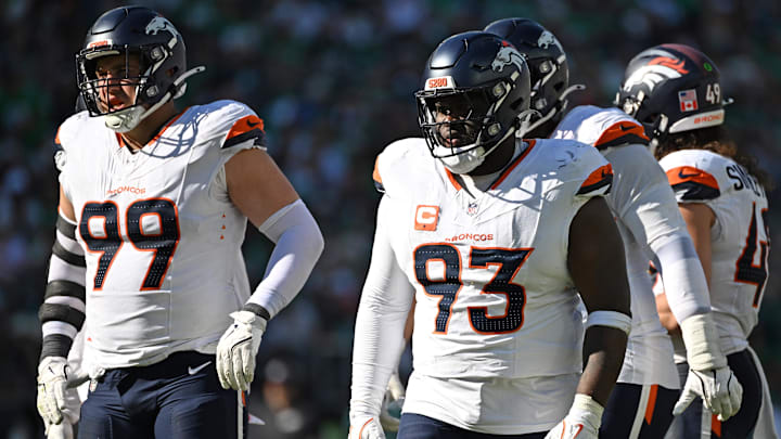 Oct 5, 2025; Philadelphia, Pennsylvania, USA; Denver Broncos defensive end Zach Allen (99) and defensive tackle D.J. Jones (93) against the Philadelphia Eagles at Lincoln Financial Field. 