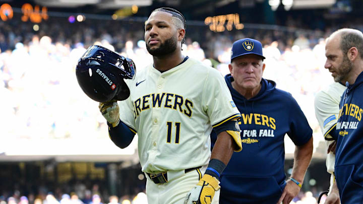 Oct 4, 2025; Milwaukee, Wisconsin, USA; Milwaukee Brewers left fielder Jackson Chourio (11) leaves the game after an apparent injury during the second inning of game one of the NLDS round for the 2025 MLB playoffs at American Family Field. Mandatory Credit: Benny Sieu-Imagn Images
