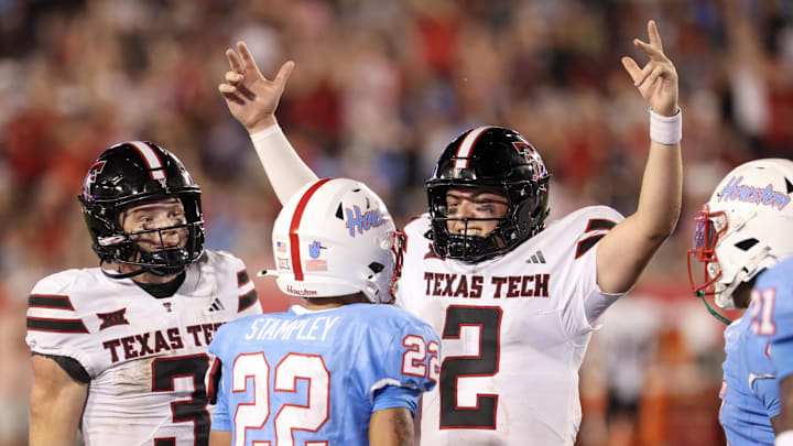 Oct 4, 2025; Houston, Texas, USA; Texas Tech Red Raiders quarterback Behren Morton (2) celebrates a Raiders touchdown against the Houston Cougars in the second half at TDECU Stadium. Mandatory Credit: Thomas Shea-Imagn Images