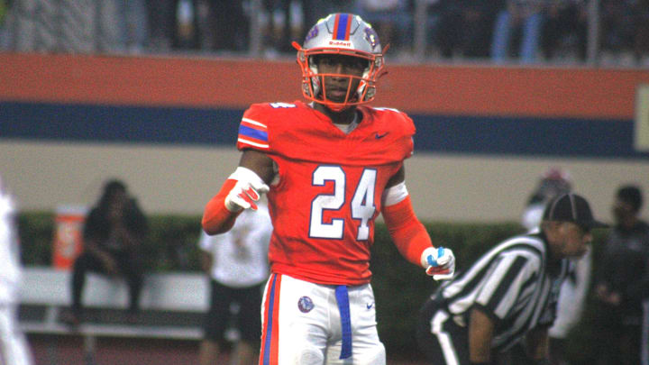 Bolles linebacker/safety Simeon Caldwell looks toward the sideline for a signal during a high school football game against Raines on August 23, 2024. [Clayton Freeman/Florida Times-Union]