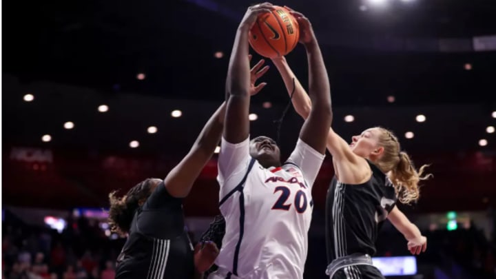 Achol Magot going uo for a contested shot