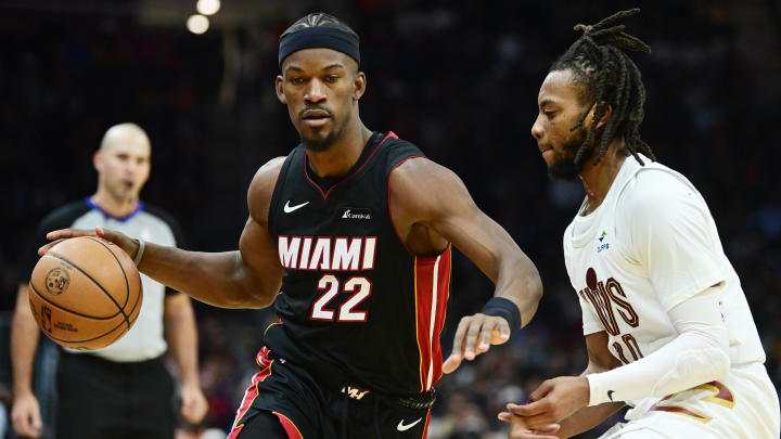 Nov 22, 2023; Cleveland, Ohio, USA; Miami Heat forward Jimmy Butler (22) drives to the basket against Cleveland Cavaliers guard Darius Garland (10) during the first half at Rocket Mortgage FieldHouse. Mandatory Credit: Ken Blaze-USA TODAY Sports
