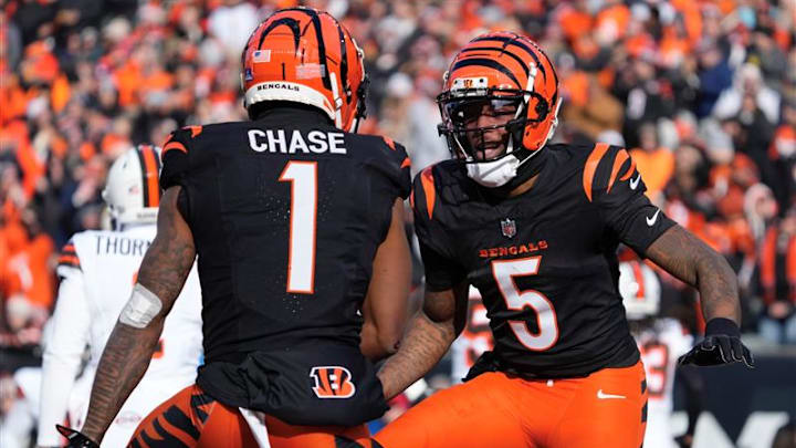 Ja'Marr Chase and Tee Higgins celebrate a touchdown.