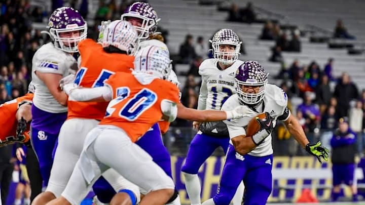Jayshon Limar takes a carry for Lake Stevens in WIAA Class 4A championship game victory over Graham Kapowsin in 2023.