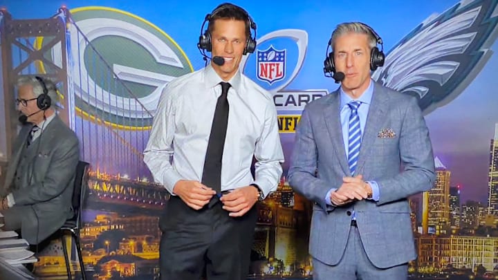 FOX's rules analyst, Mike Pereira was seen in the booth during a live shot in Sunday's Packers-Eagles game. 
