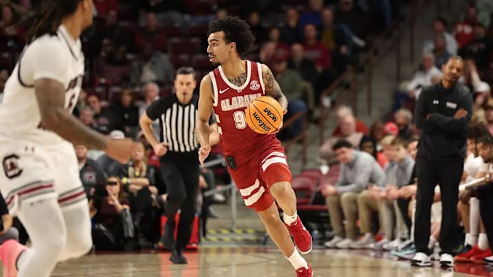 Alabama guard Houston Mallette (95) dribbles the ball against South Carolina at Colonial Life Arena in Columbus, SC on Wednesday, Jan 8, 2025.