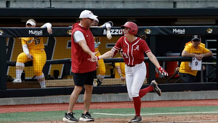 Alabama Head Coach Patrick Murphy and Alabama Softball Player Ana Roman (21) in action against Mizzou at Mizzou Softball Stadium in Colombia, MO on Sunday, Mar 22, 2026.