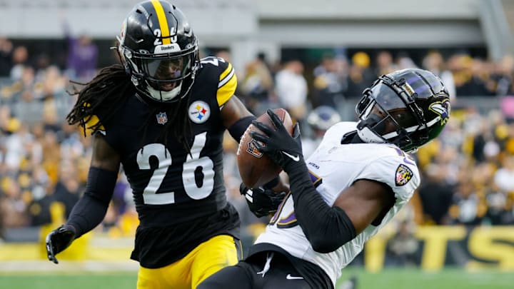 PITTSBURGH, PA - NOVEMBER 17: Nelson Agholor #15 of the Baltimore Ravens in action against Donte Jackson #26 of the Pittsburgh Steelers on November 17, 2024 at Acrisure Stadium in Pittsburgh, Pennsylvania.