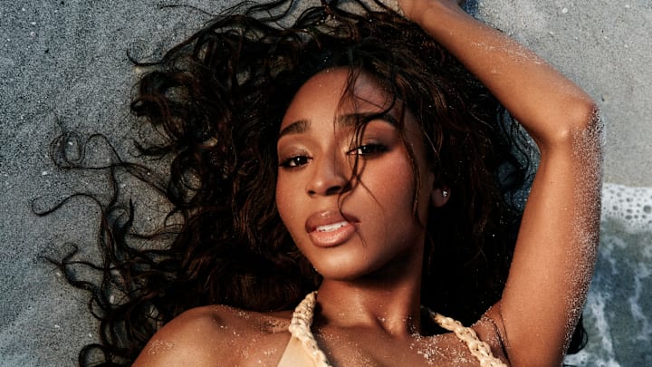 Normani was photographed by Katherine Goguen on Captiva Island, Fla. Swimsuit by Solara Official.