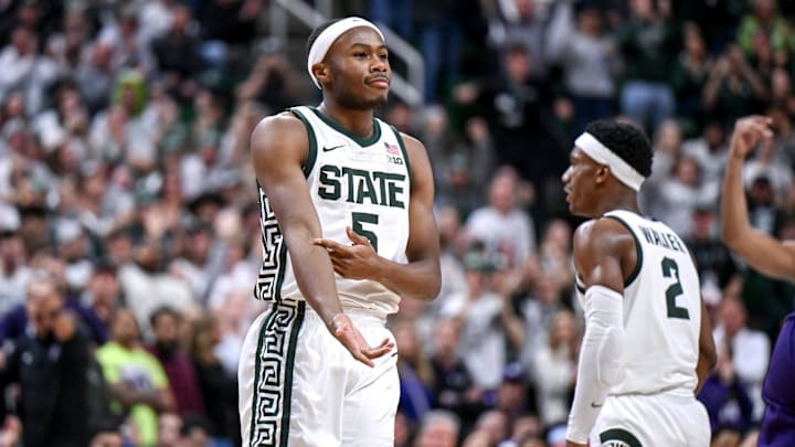 Michigan State's Tre Holloman celebrates after sinking free throws against Northwestern during the