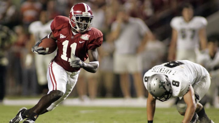 September 2, 2006; Tuscaloosa, AL, USA; Alabama Crimson Tide wide receiver Matt Caddell (11) drives through the Hawaii Warriors secondary in the second half of action at Bryant-Denny Stadium.   Mandatory Credit: John David Mercer-USA TODAY Sports © 2006 John David Mercer