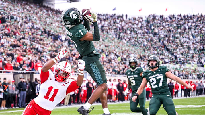 Michigan State's Jaden Mangham intercepts a Nebraska pass in the end zone during the second quarter