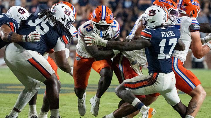 Florida Gators running back Jadan Baugh (13) runs the ball as Auburn Tigers take on Florida Gators at Jordan-Hare Stadium in Auburn, Ala. on Saturday, Sept. 19, 2026. Florida Gators defeated Auburn Tigers 44-39. Florida Gators running back Jadan Baugh (13) runs the ball as Auburn Tigers take on Florida Gators at Jordan-Hare Stadium in Auburn, Ala. on Saturday, Sept. 19, 2026. Florida Gators defeated Auburn Tigers 44-39.