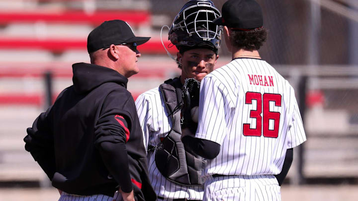 Texas Tech pitching coach Steve Foster (left) meets with Matt Quintanar (center) and Connor Moahn during a non-conference baseball game, Sunday, Feb. 22, 2026, at Rip Griffin Park. Texas Tech pitching coach Steve Foster (left) meets with Matt Quintanar (center) and Connor Moahn during a non-conference baseball game, Sunday, Feb. 22, 2026, at Rip Griffin Park.
