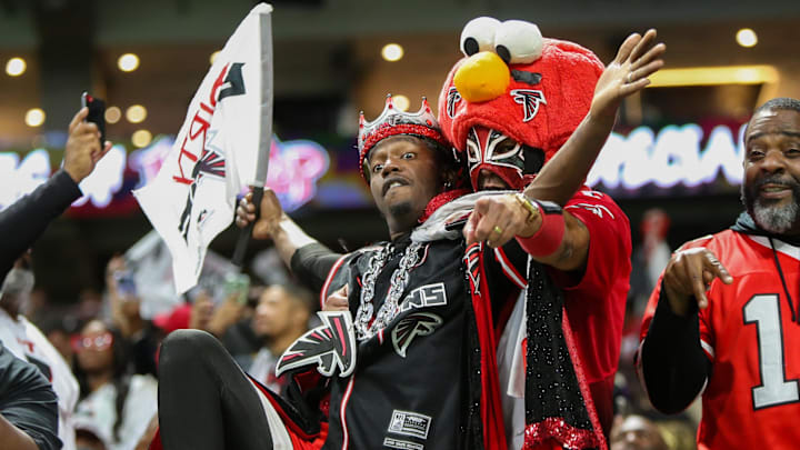 Nov 26, 2023; Atlanta, Georgia, USA; Atlanta Falcons fans in the stands against the New Orleans Saints in the second quarter at Mercedes-Benz Stadium. Mandatory Credit: Brett Davis-Imagn Images