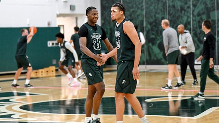 Michigan State's Cam Ward, left, slaps hands with Jesse McCulloch during the first day of basketball practice on Monday, Sept. 22, 2025, at the Breslin Center in East Lansing. Michigan State's Cam Ward, left, slaps hands with Jesse McCulloch during the first day of basketball practice on Monday, Sept. 22, 2025, at the Breslin Center in East Lansing.