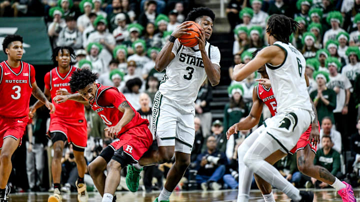 Michigan State's Cam Ward gains possession of the ball after a contested pass against Rutgers during the first half on Thursday, March 5, 2026, at the Breslin Center in East Lansing.