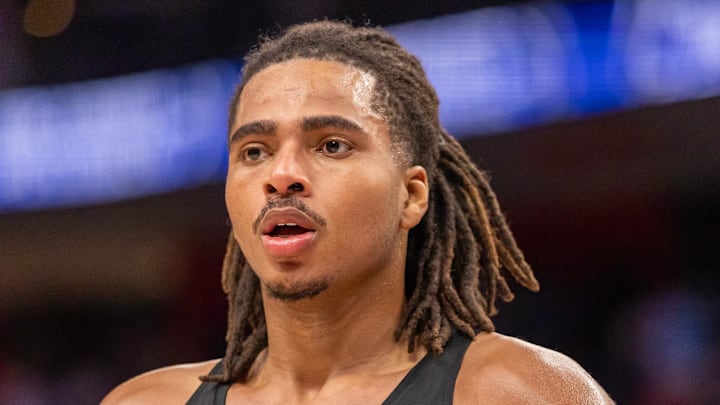 Mar 31, 2026; Detroit, Michigan, USA; Toronto Raptors Collin Murray-Boyles (12) walks off the court after loosing to the Detroit Pistons at Little Caesars Arena. Mandatory Credit: David Reginek-Imagn Images