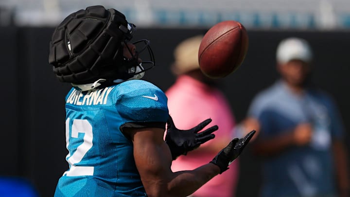 Jacksonville Jaguars wide receiver Devin Duvernay (12) catches a pass during the seventh day of an NFL football training camp practice Wednesday, July 31, 2024 at EverBank Stadium’s Miller Electric Center in Jacksonville, Fla.