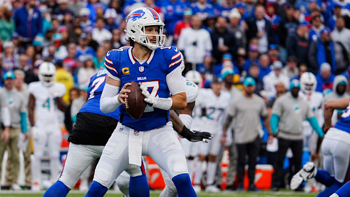 Bills quarterback Josh Allen waits before throwing to a receiver during second-half action at Highmark Stadium.