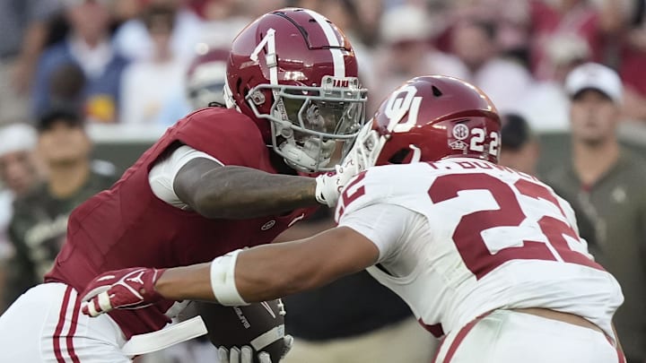 Oklahoma Sooners defensive back Peyton Bowen (22) closes in to make a tackle on Alabama Crimson Tide wide receiver Isaiah Horton (1) at Saban Field at Bryant-Denny Stadium. 