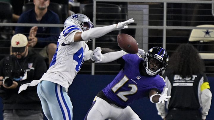 Dallas Cowboys cornerback Zion Childress breaks up a pass intended for Baltimore Ravens wide receiver Malik Cunningham 