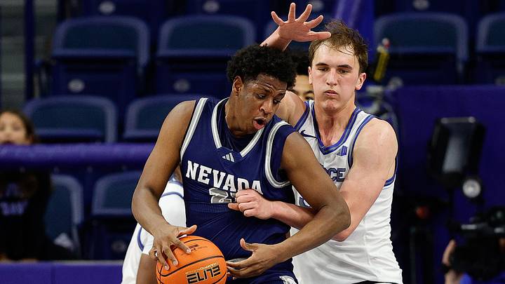Feb 4, 2025; Colorado Springs, Colorado, USA; Nevada Wolf Pack forward Justin McBride (21) and Air Force Falcons center Wesley Celichowski (51) battle for the ball in the first half at Clune Arena. Mandatory Credit: Isaiah J. Downing-Imagn Images Feb 4, 2025; Colorado Springs, Colorado, USA; Nevada Wolf Pack forward Justin McBride (21) and Air Force Falcons center Wesley Celichowski (51) battle for the ball in the first half at Clune Arena. Mandatory Credit: Isaiah J. Downing-Imagn Images