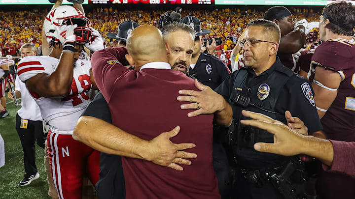 Nebraska coach Matt Rhule hugs Minnesota coach P.J. Fleck after Huskers lost, 24-6, on Friday night. Nebraska coach Matt Rhule hugs Minnesota coach P.J. Fleck after Huskers lost, 24-6, on Friday night.
